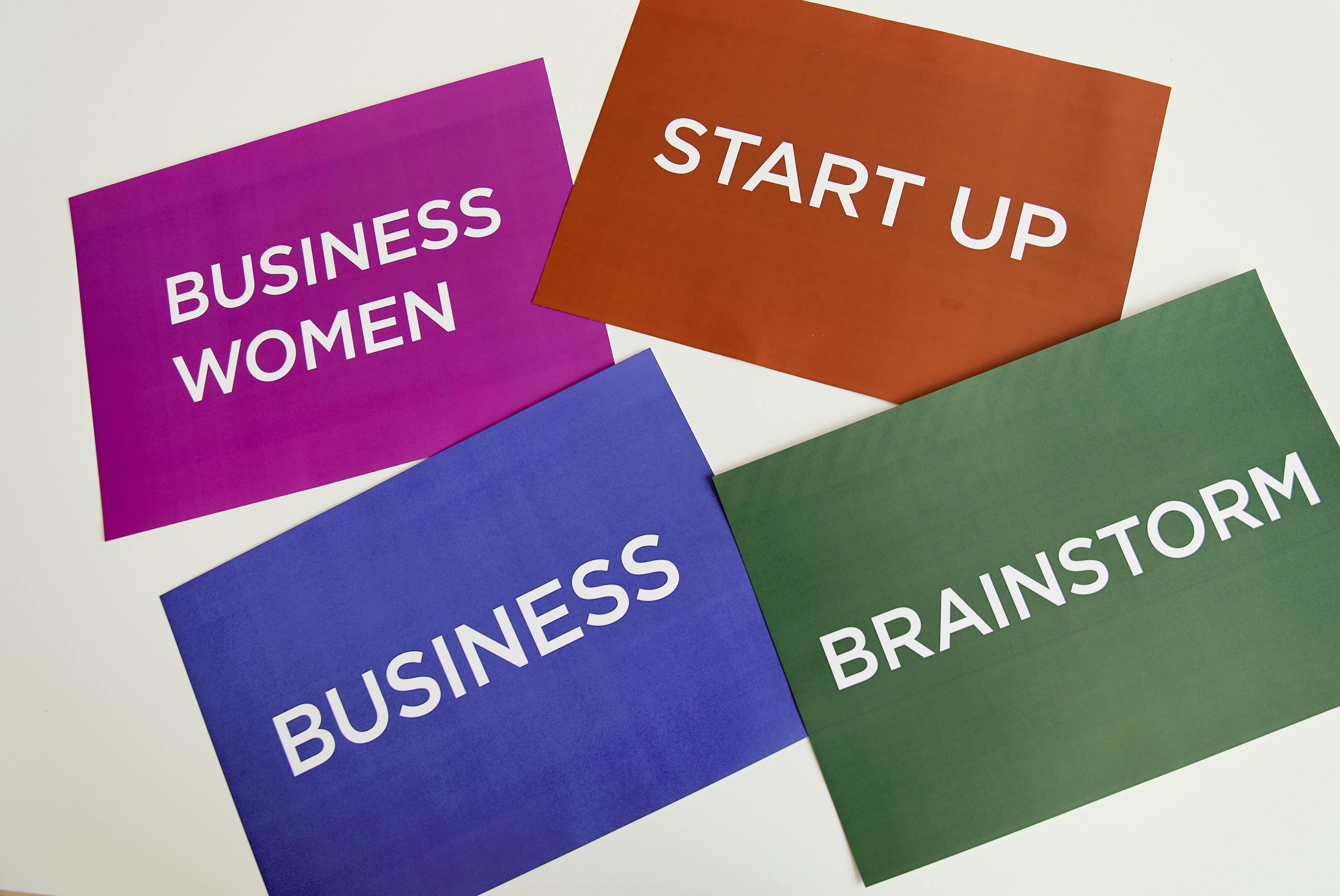 company mission with Colorful cards with business terms on a desk background.